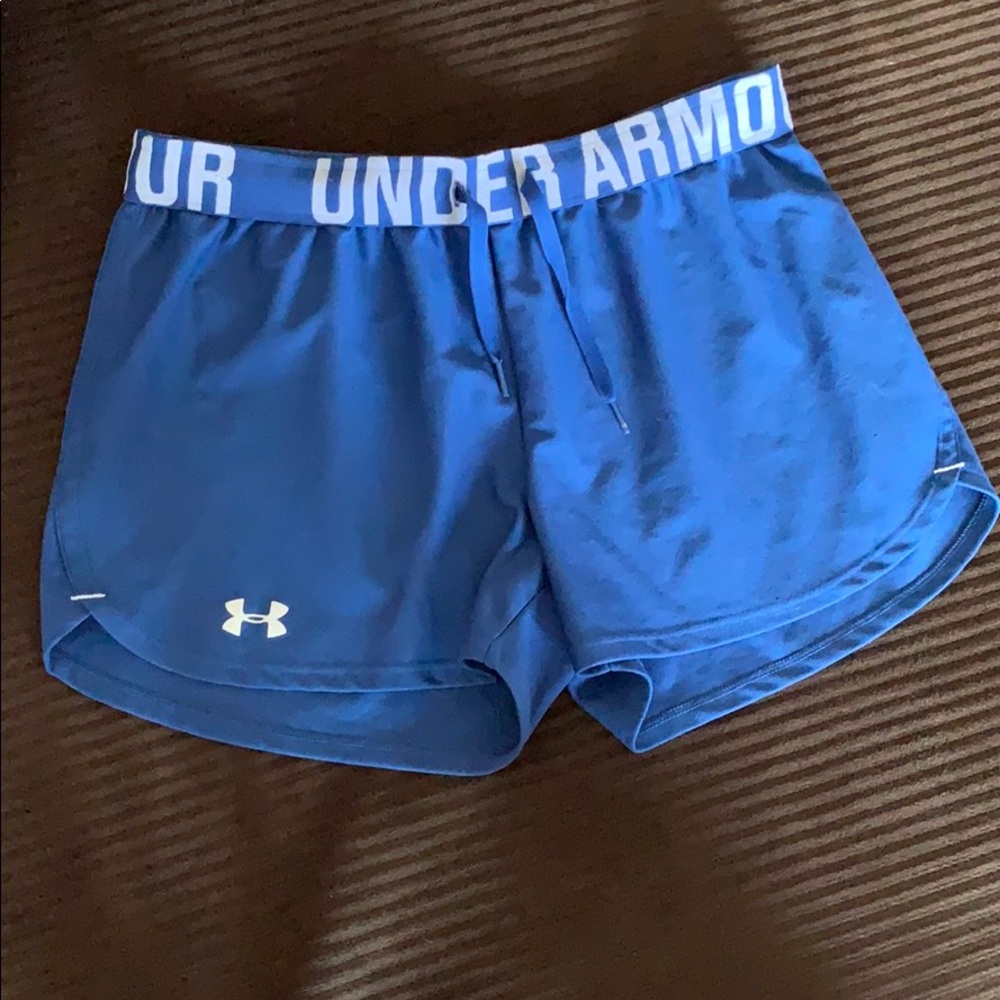 Under Armour blue running shorts.